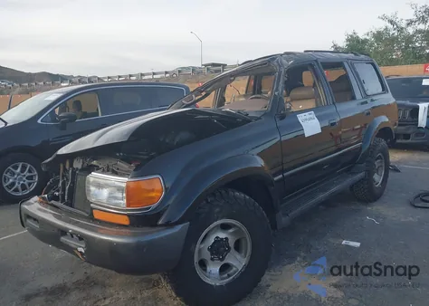 1997 Toyota Land Cruiser из США, поврежденный, VIN JT3HJ85J8V0156332